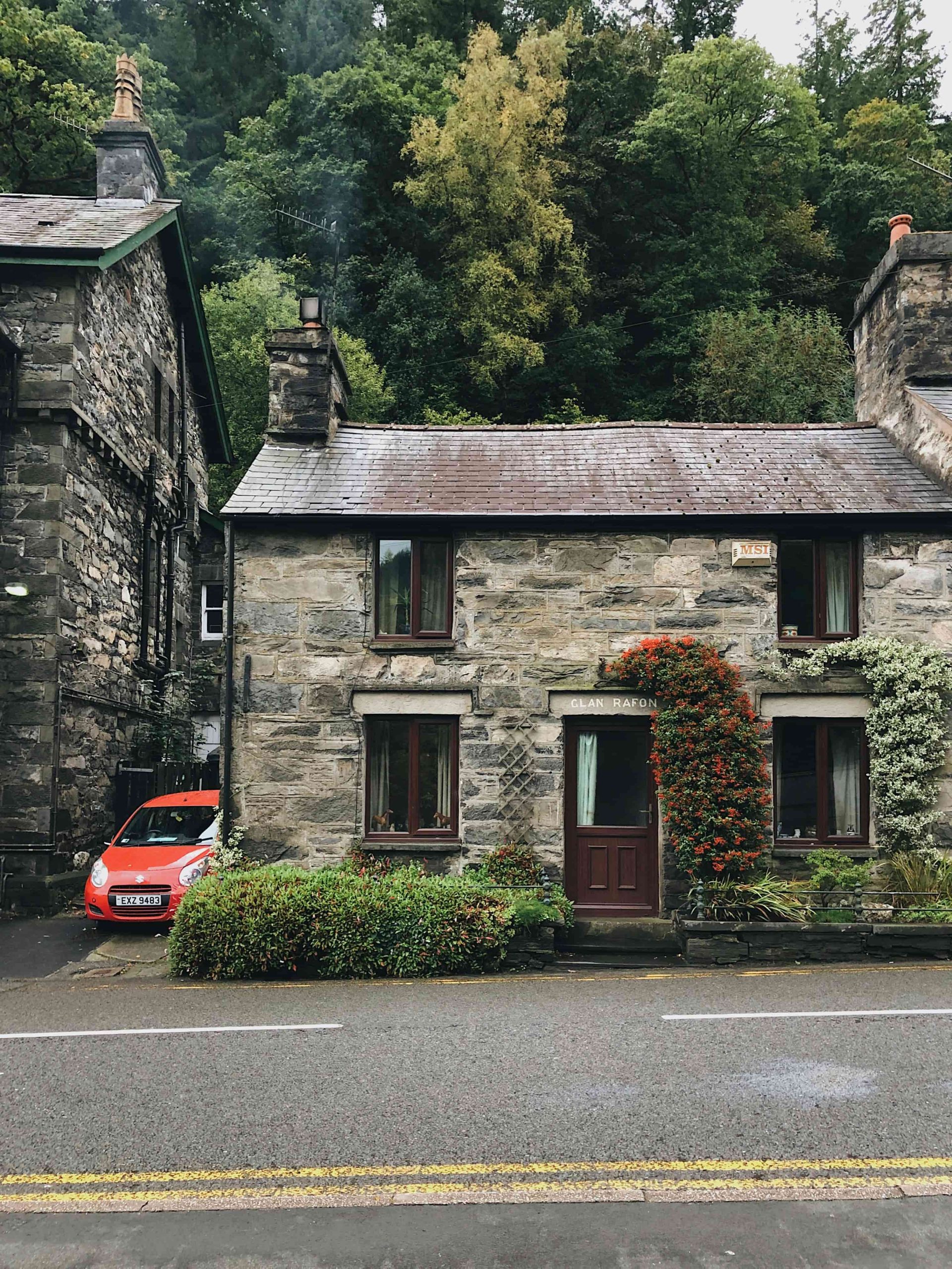 homes that need pest control in the Uk with a red van by the side of it