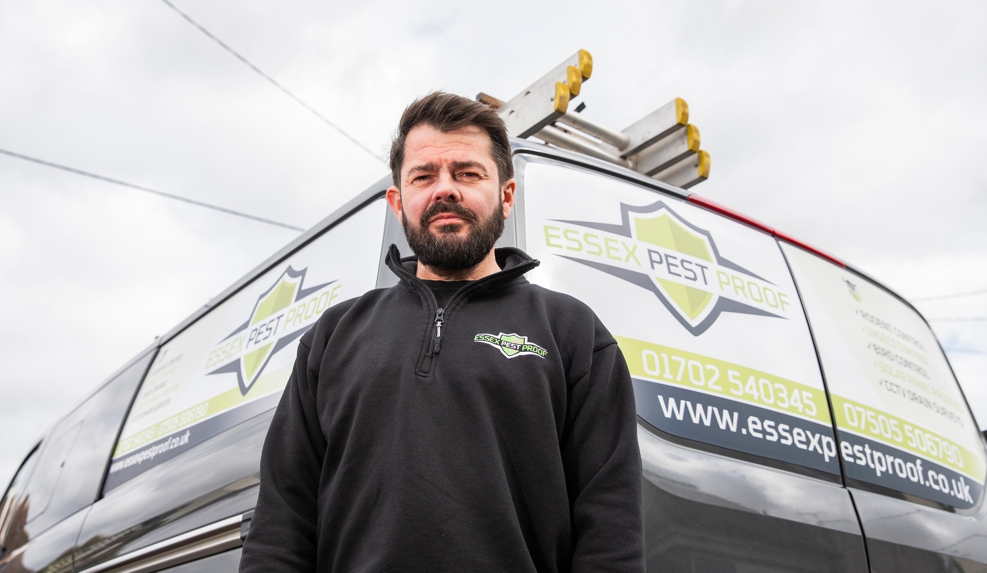 Pest controller standing in front of an Essex Pest Proof branded van