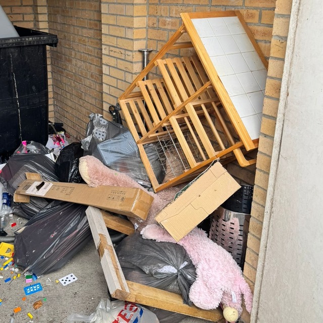 A lot of furniture in a garage 