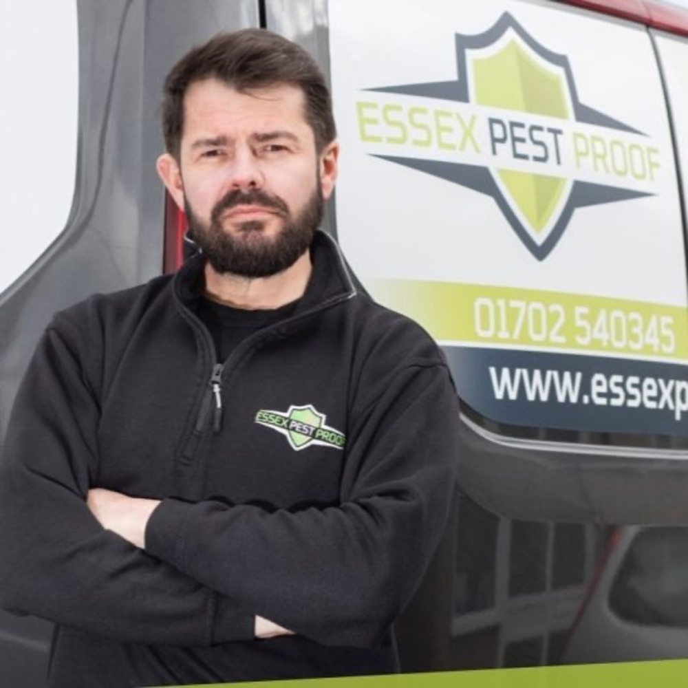 Essex Pest Proof branded van with pest controller in front of it